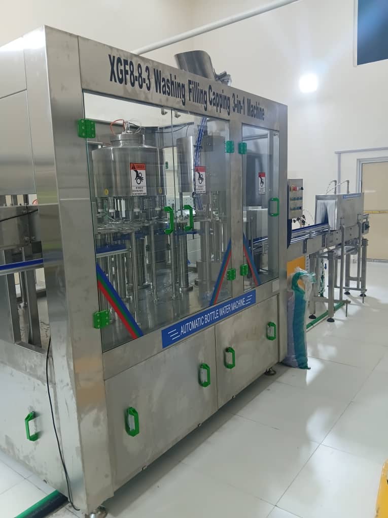 Complete Bottle Water Production Machine (Treatment, Plastic Moulding, Filling, Packaging and Date Coding)